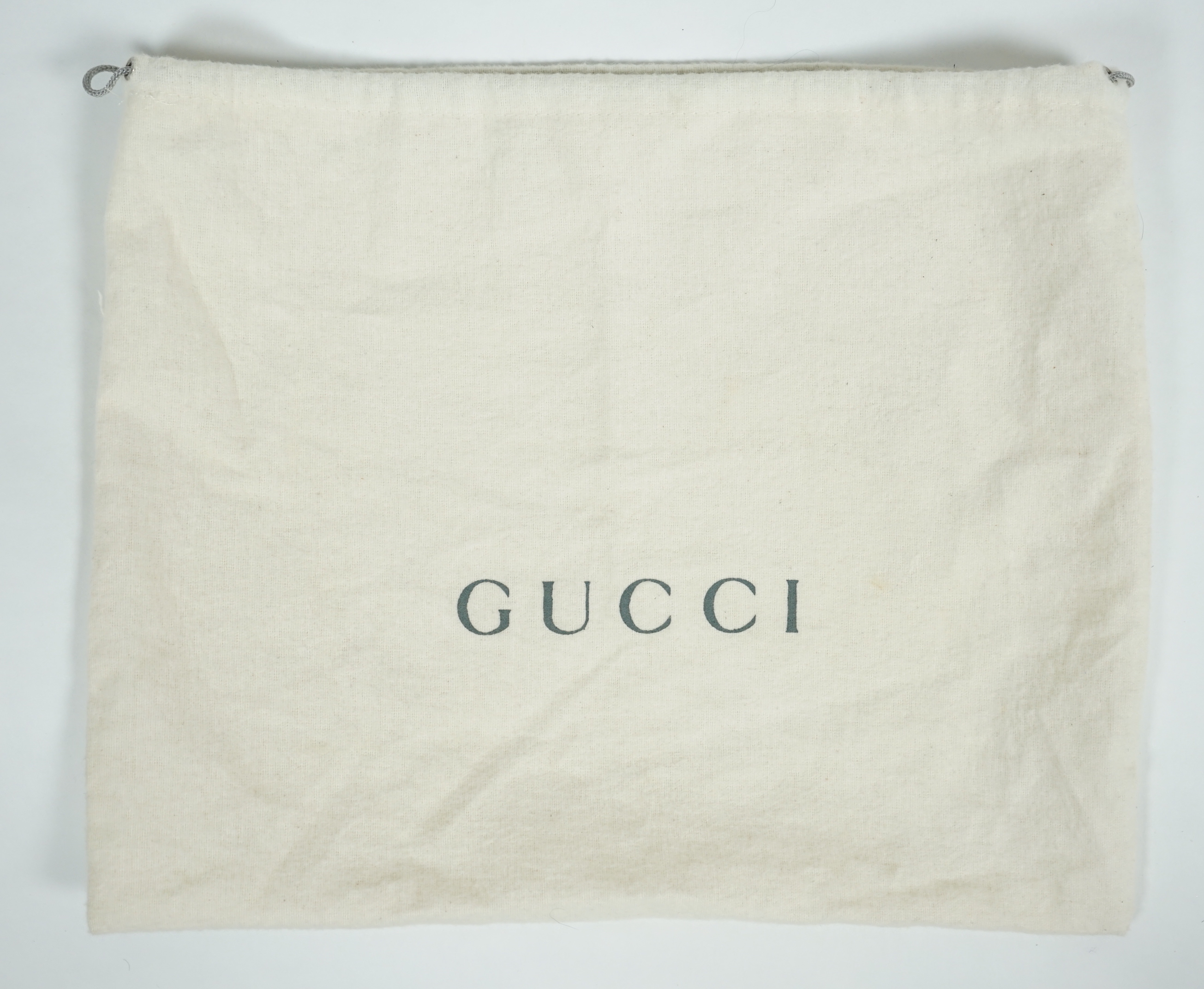 A vintage Gucci black Tom Ford era suede handbag, with dust bag, width 21cm, height overall 35cm, depth 11cm, Please note this lot attracts an additional import tax of 20% on the hammer price